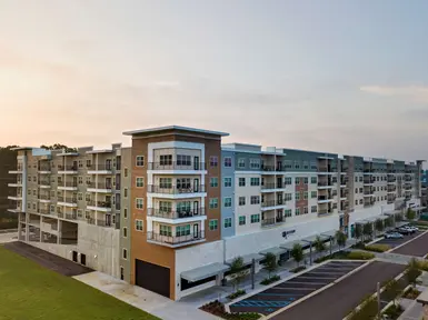 The District Lofts, a 261-unit mid-rise apartment community.