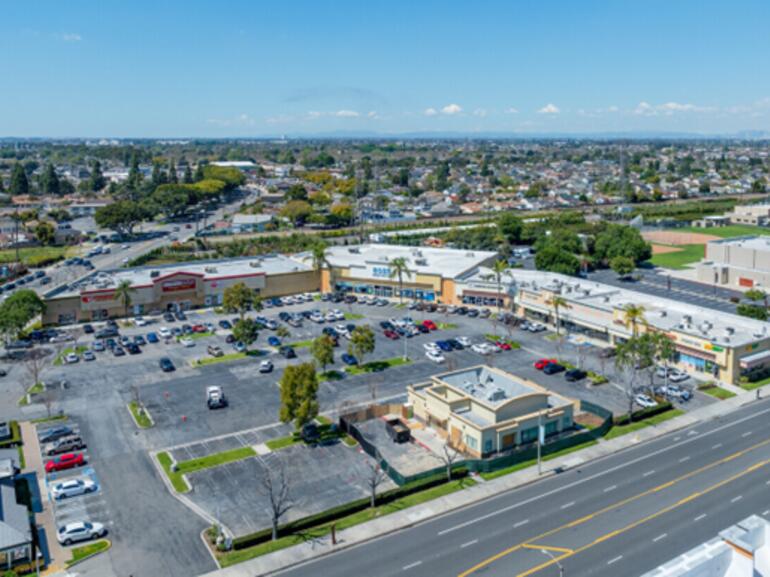 Grocery-anchored multi-tenant shopping facility