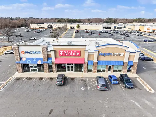 Overhead image of a three tenant retail property with PNC Bank, T-Mobile and Aspen Dental
